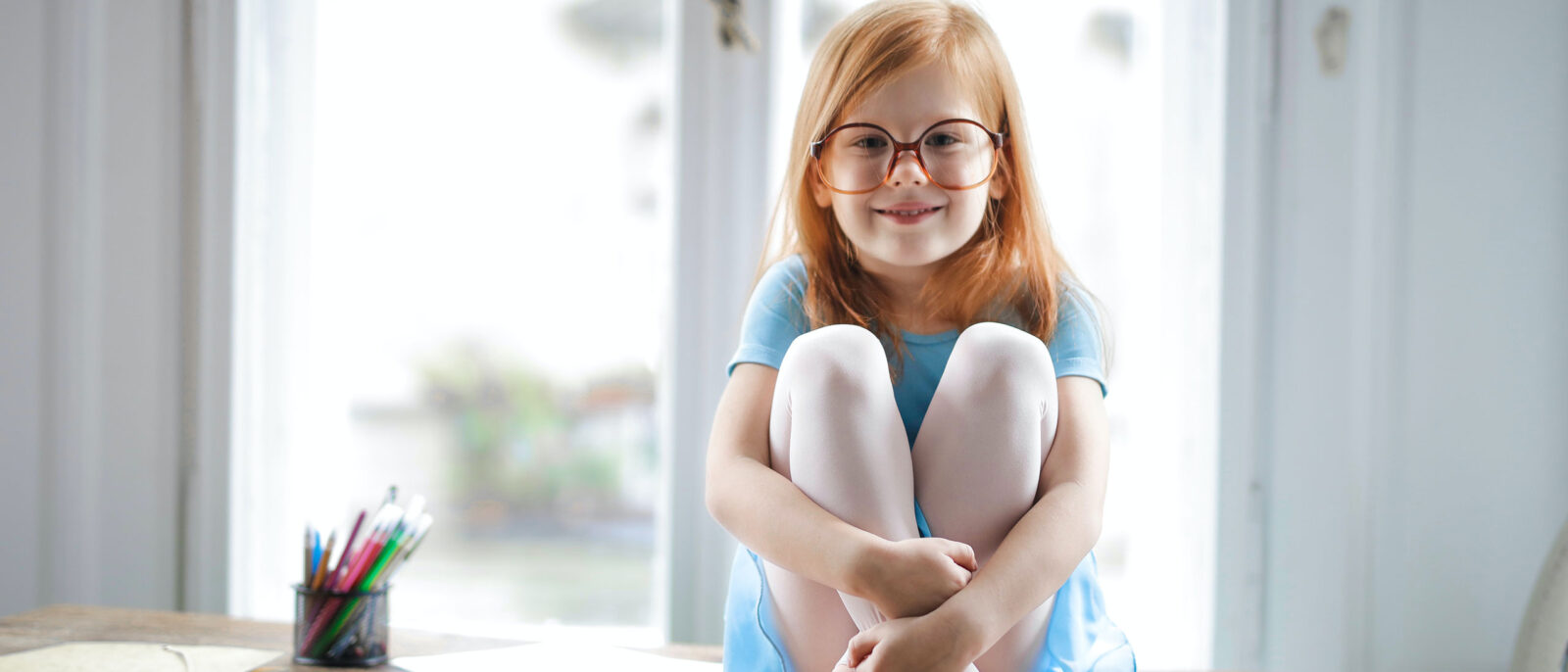 Girl with Glasses Sitting Girl with Glasses Sitting